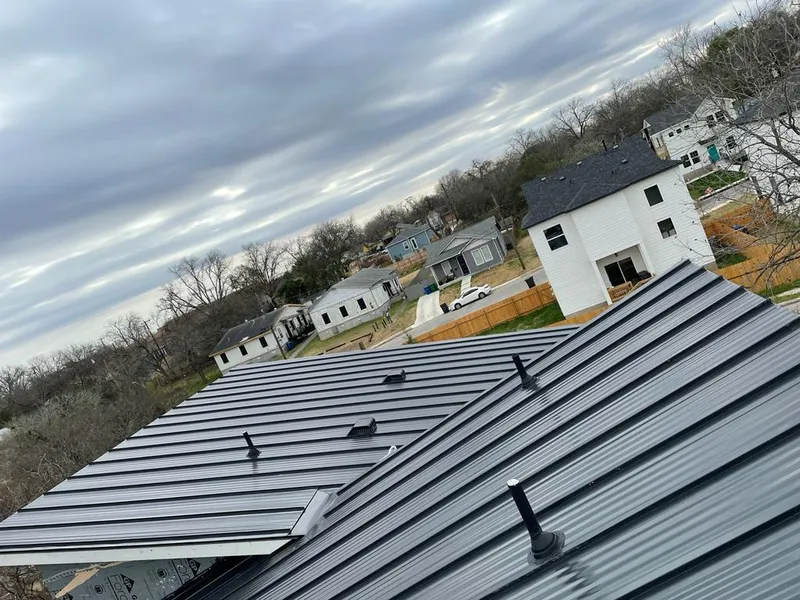 Standing seam metal roof panels with vents for Skylight Repair in Westchester